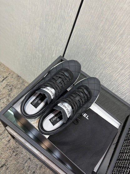 Chanel 26 Quilted Sneaker Black in Lambskin 602467