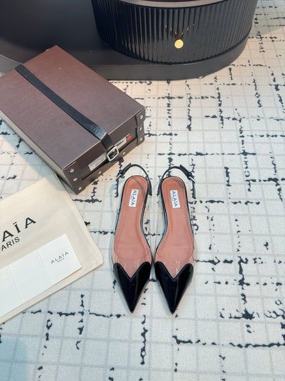 ALAIA FLAT SLINGBACK IN BLACK PATENT CALFSKIN AND FILM